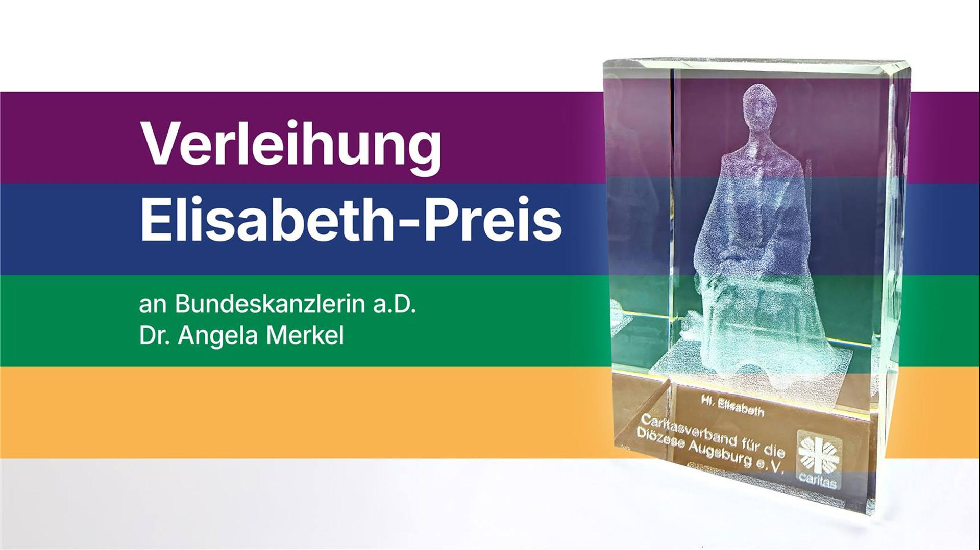 Das Foto zeigt den Elisabethpreis des Caritasverbandes für die Diözese Augsburg. Es handelt sich dabei um eine sitzende Figur der heiligen Elisabeth, die in ein Glasquader eingelasert wurde. Er steht vor dem mehrfarbigen Banner zur Jahreskampagne Zusammen geht was. 